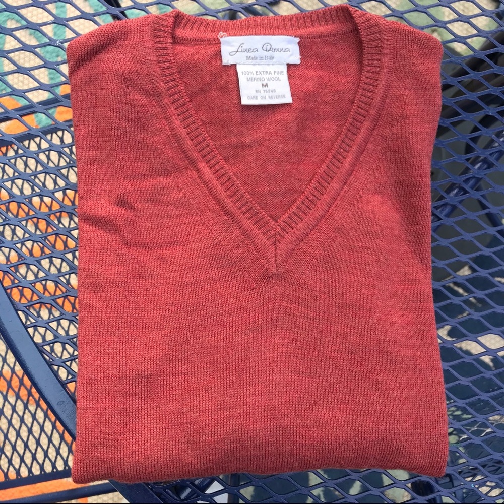 Rust heathered v neck. 100% Extra Fine Merino Wool